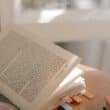 white book page on brown wooden table