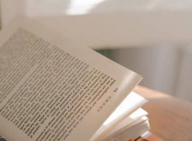 white book page on brown wooden table